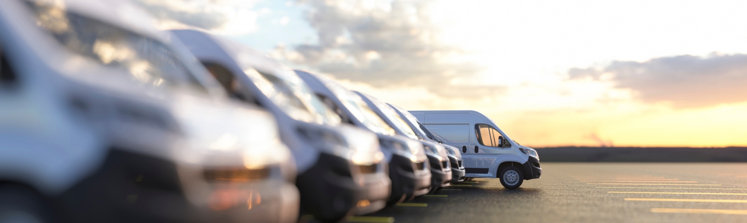 Fleet of vans in a parking lot